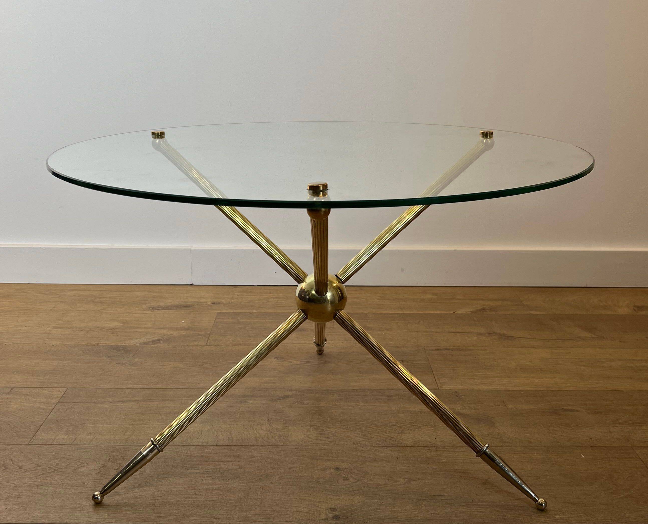 Round tripod designer coffee table in brass