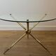 Round tripod designer coffee table in brass