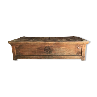 Large old chest in solid wood carved with Queyras style rosettes, opening from above