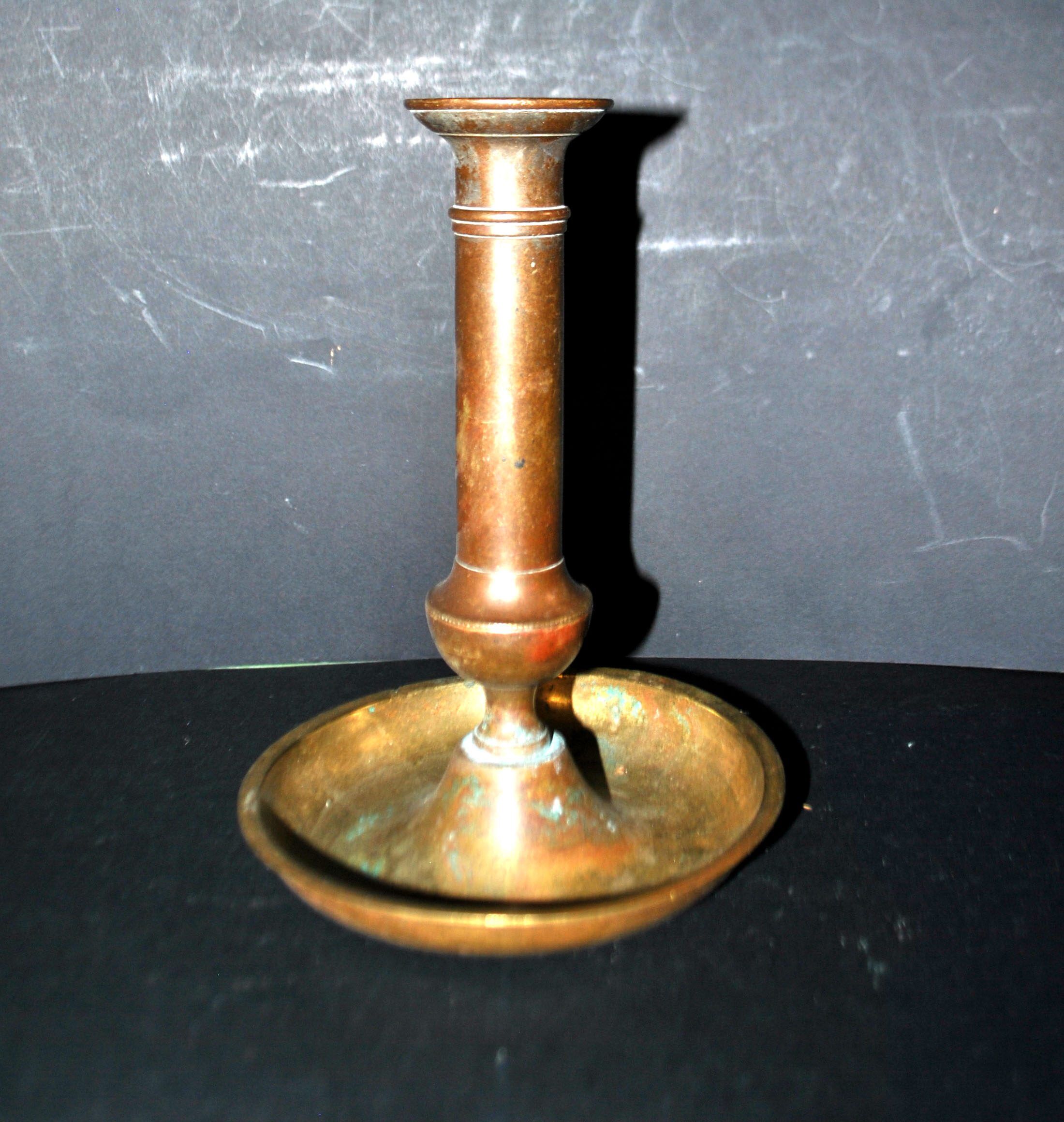 Antique push candle holder, 18th century gilded carved bronze candlestick.