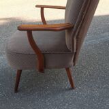 Cocktail armchair with armrests