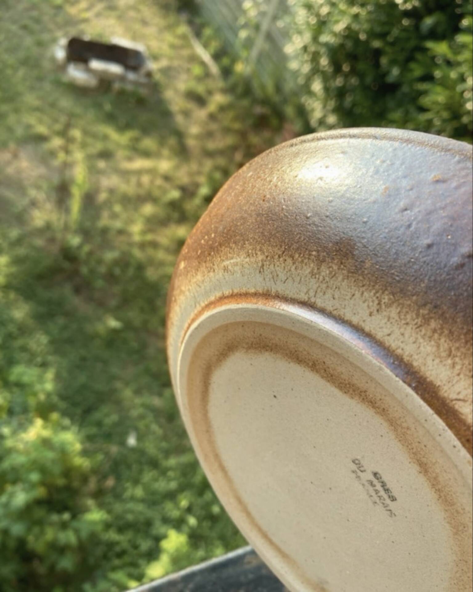Deep plates made of organic, wild, earthy marsh clay.