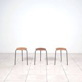 Stackable 3-legged stools in teak / metal