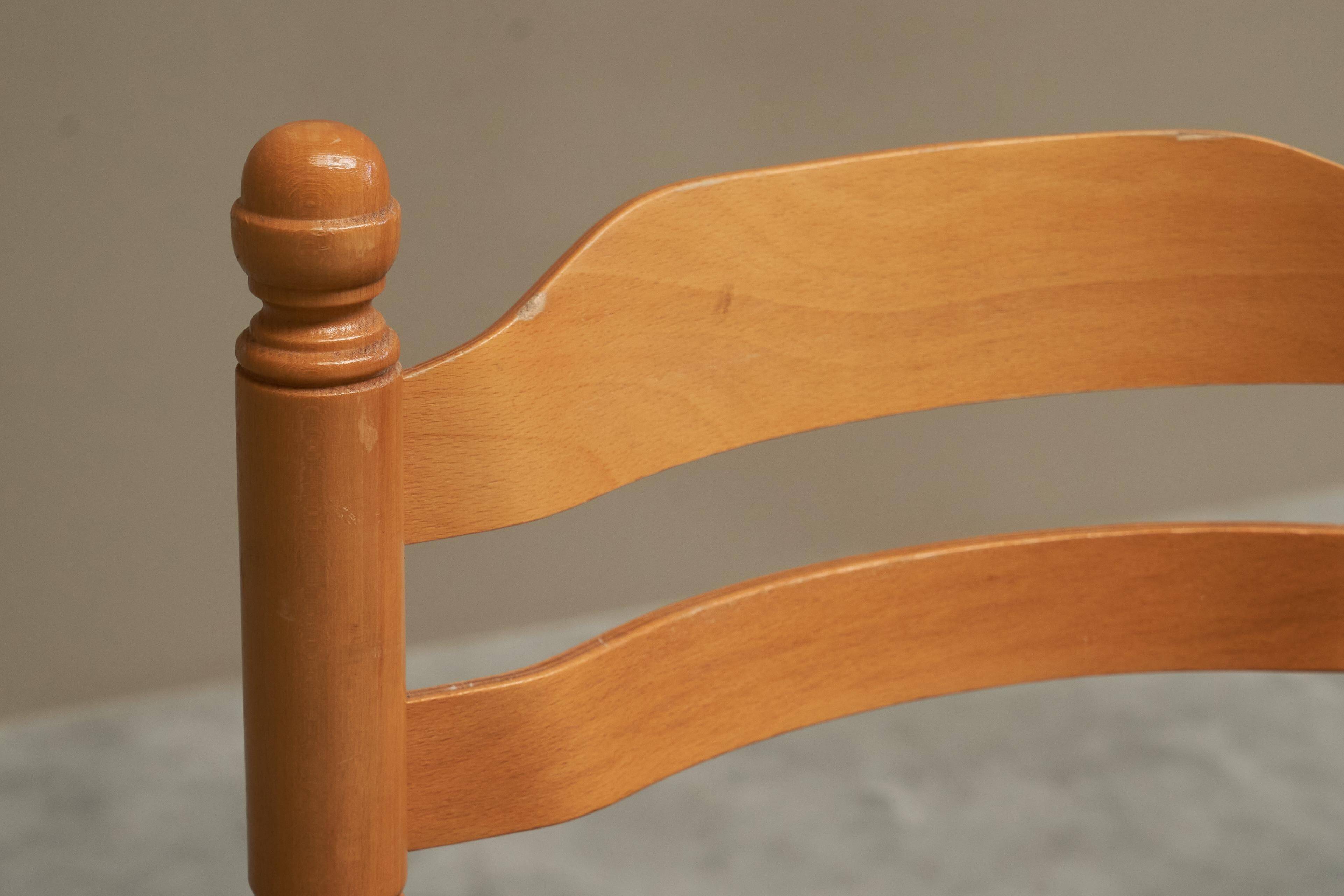 Set of 4 Mid Century beech dining chairs from the 1970s.