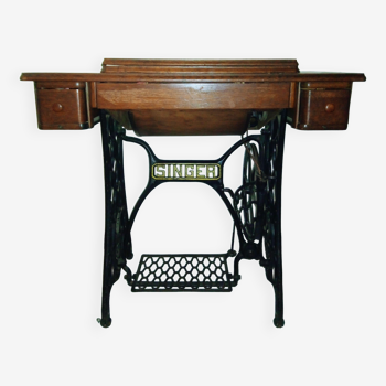 Singer sewing machine with original furniture and work table, cast iron foot, functional.