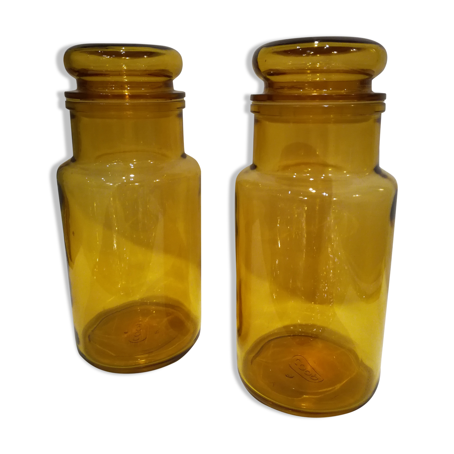 Two amber jars