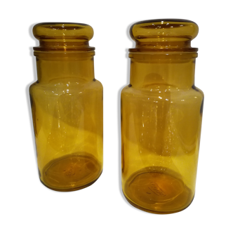 Two amber jars