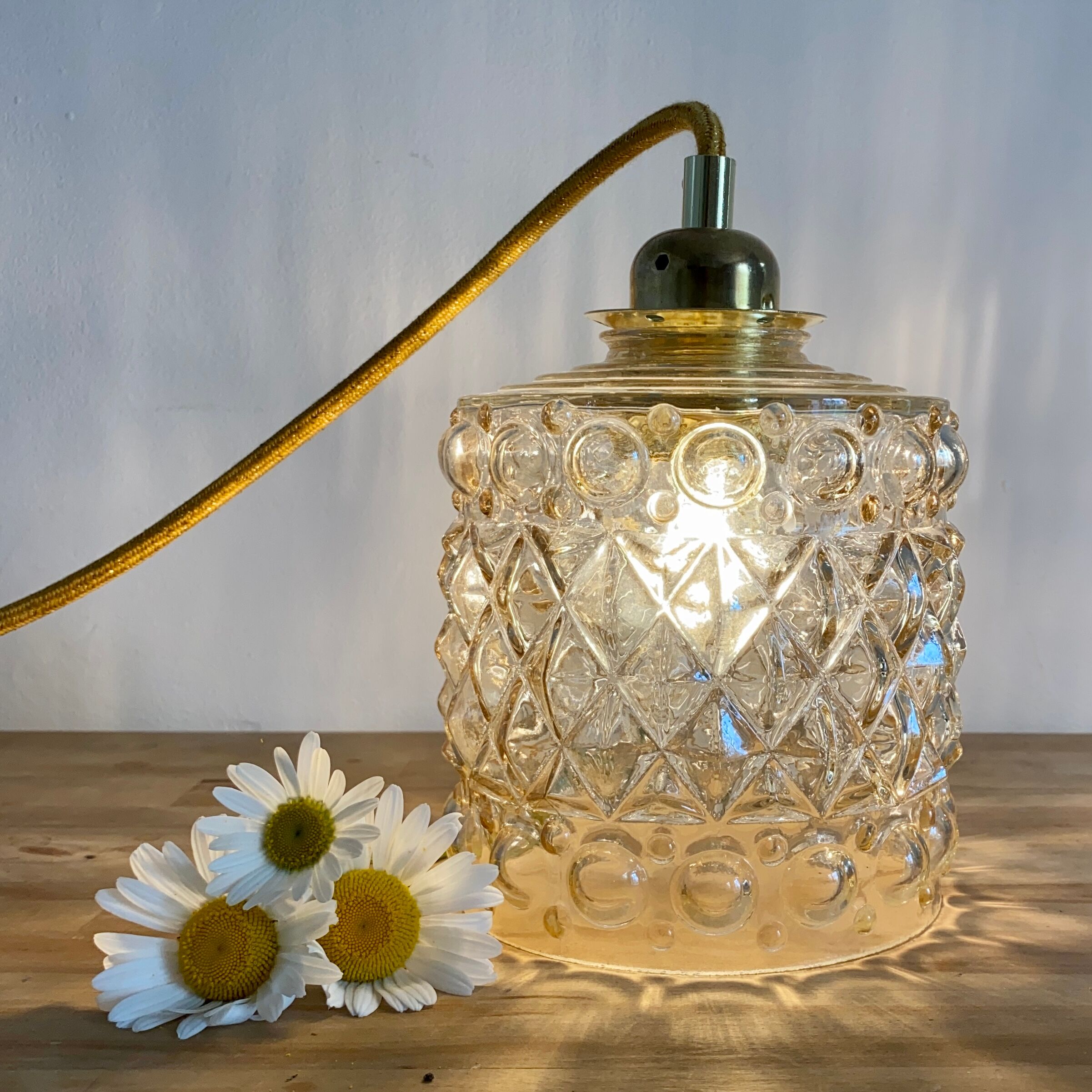 Vintage tulip lamp in amber glass