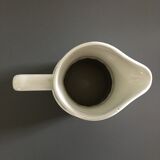 White barrel pitcher