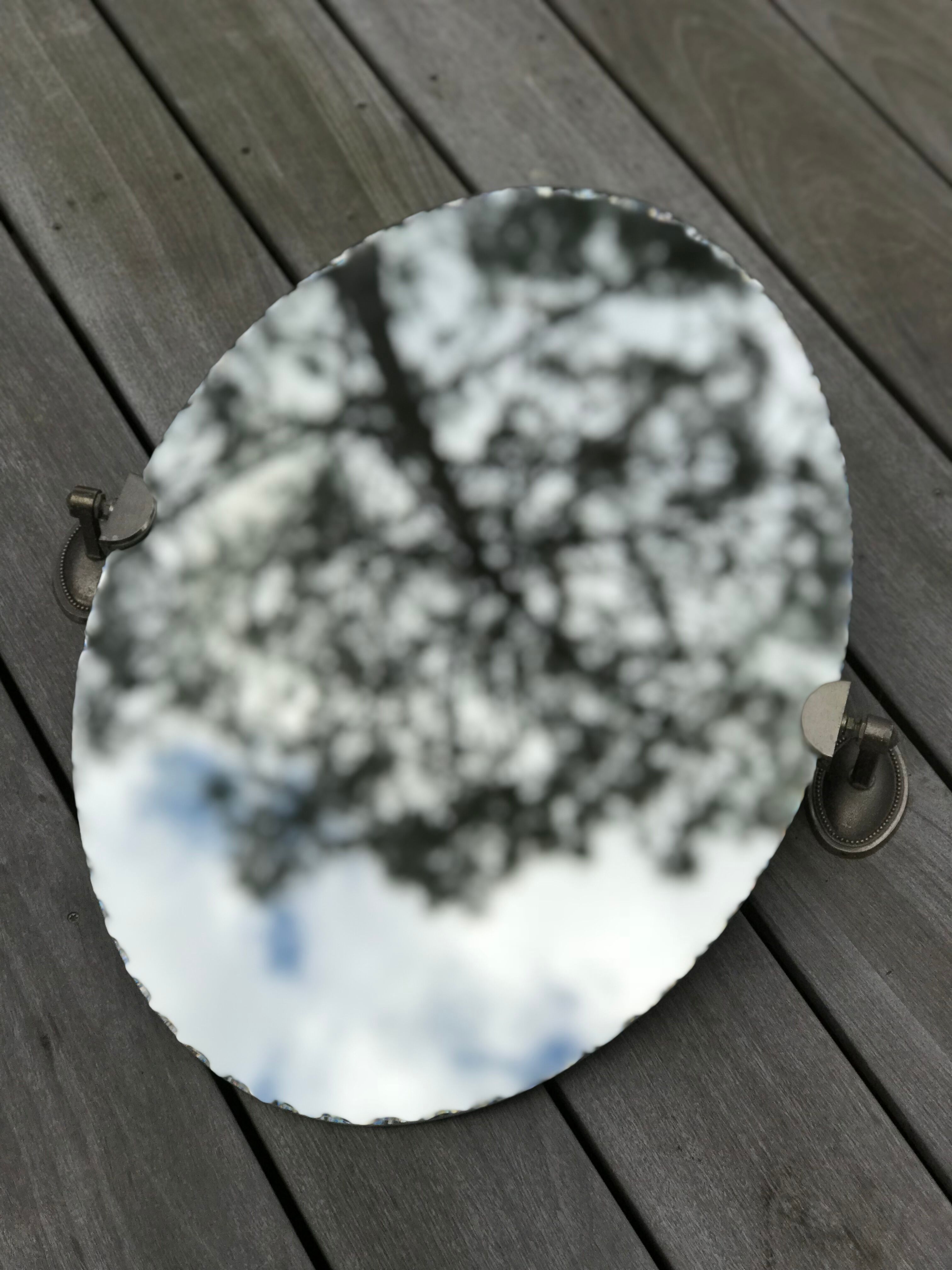 Oval mirror bevelled with removable metal media 43x60cm