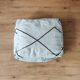 Berber Moroccan pouf in black and white.