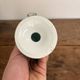 Pair of White and Black Porcelain Candle Holders with Berain Scroll Decoration, Baluster Style
