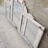 Old arched mirror in Burmese teak