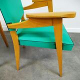 Pair of wood and vinyl armchairs