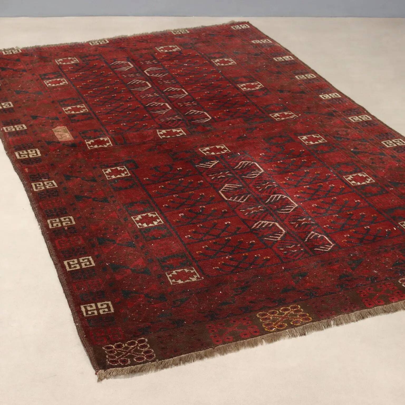 Ancient Asian wool rug, hand-knotted, 82 x 51 in.