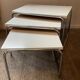Trio of vintage nesting tables in Formica and chrome metal
