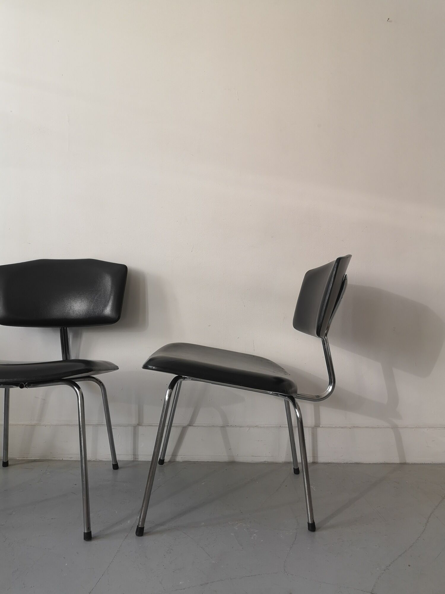Pair of heaters design in black skai leather and metal, 1970