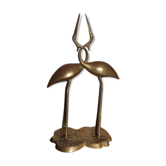 Couple of brass herons
