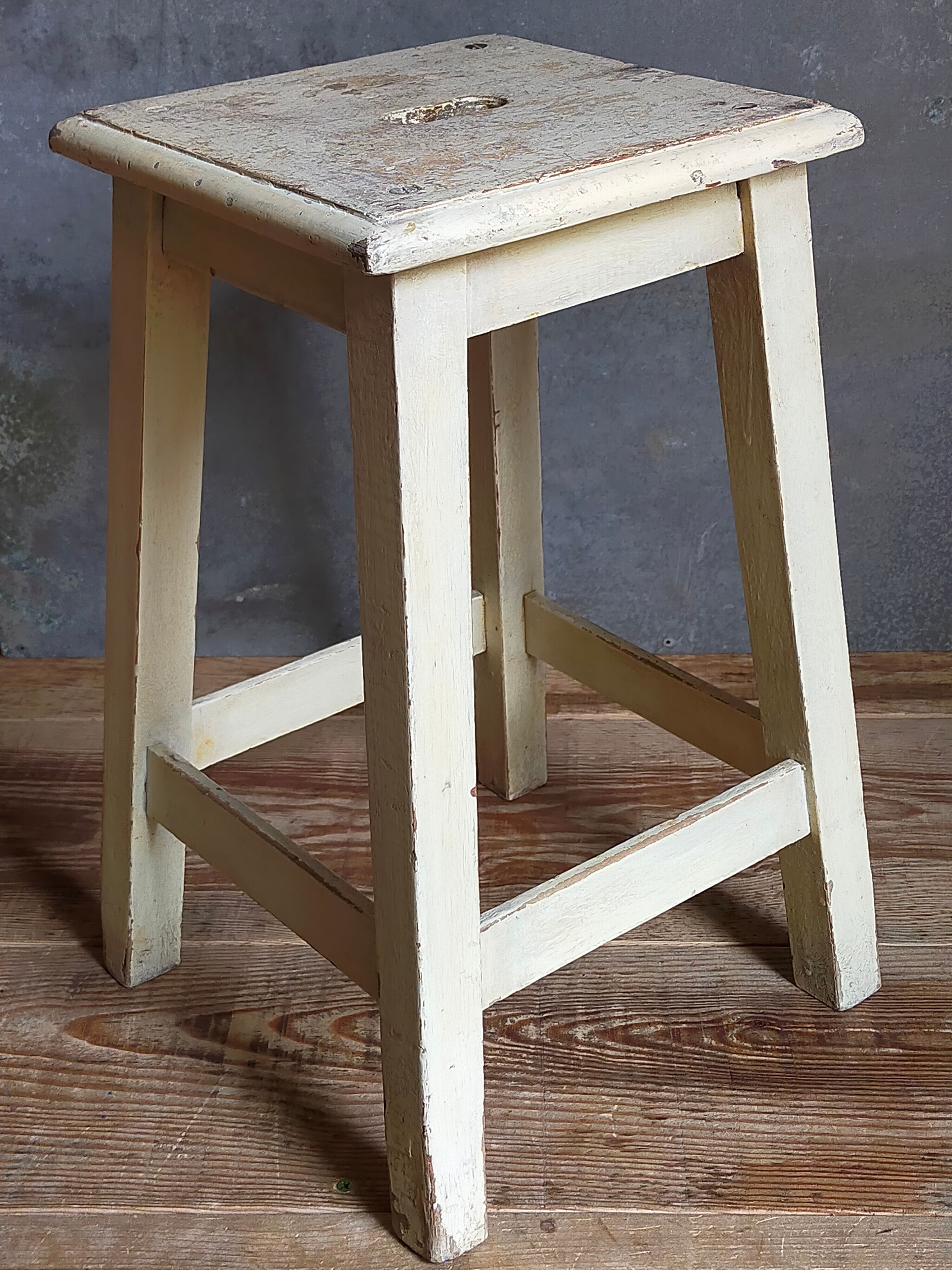 Wooden workshop stool with old patina