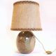 Flattened ball ceramic lamp