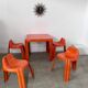 Table and 4 chairs in orange fiberglass design from the 70s Patrick Gingembre Paulus edition