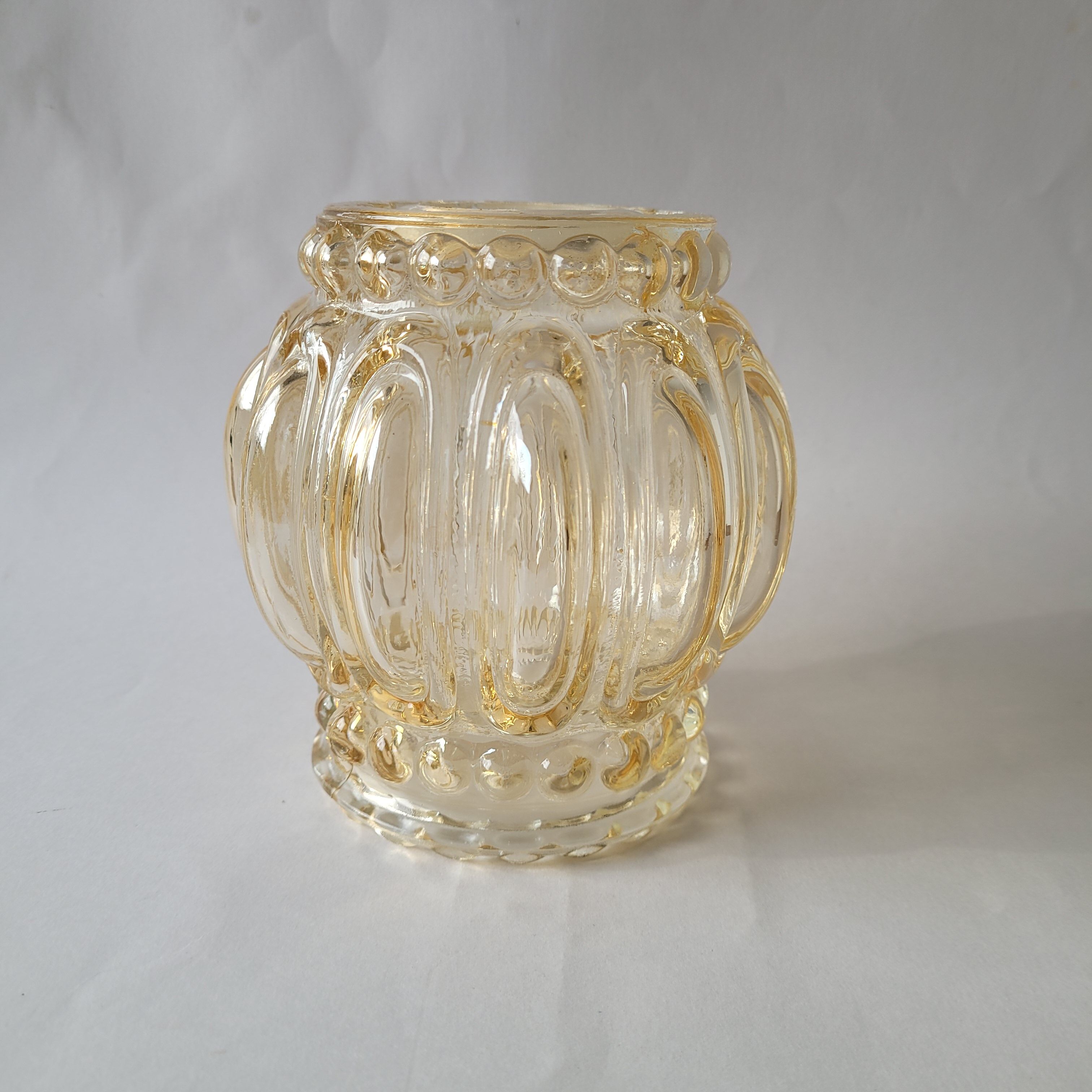 Yellow molded glass globe