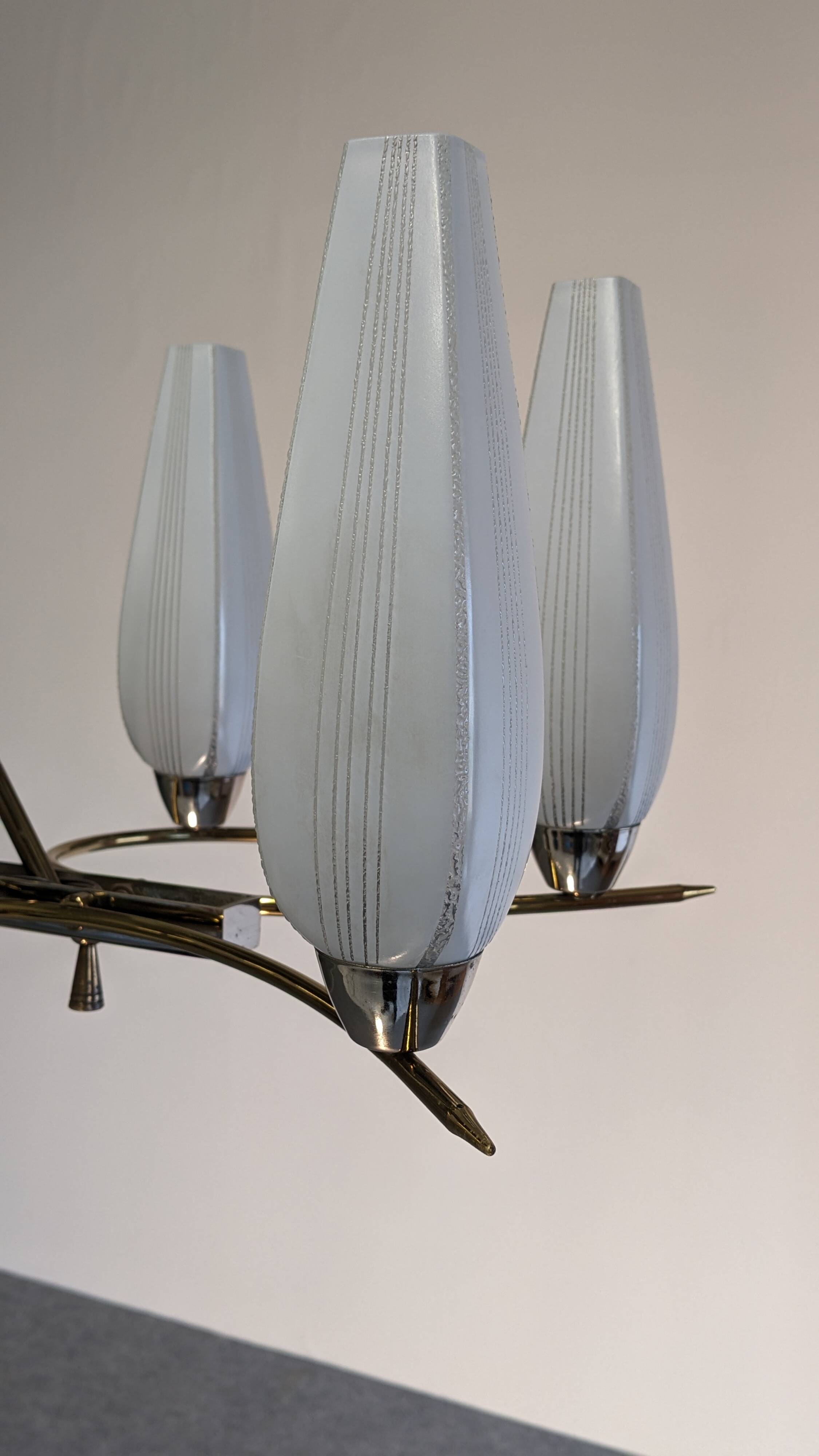 Eight-light chandelier in glass and brass, France circa 1960.