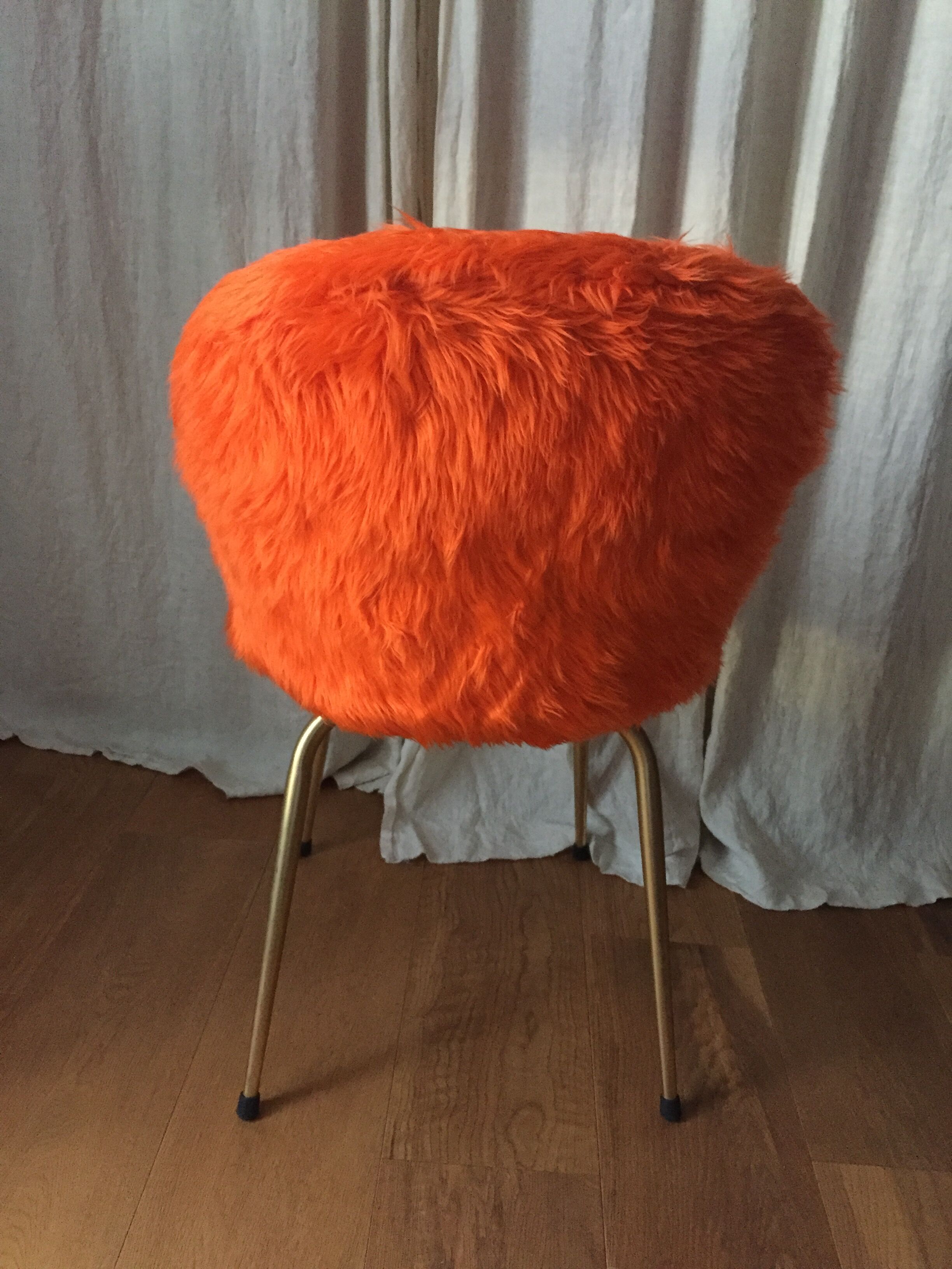 Vintage orange moumoute chair of original 60s