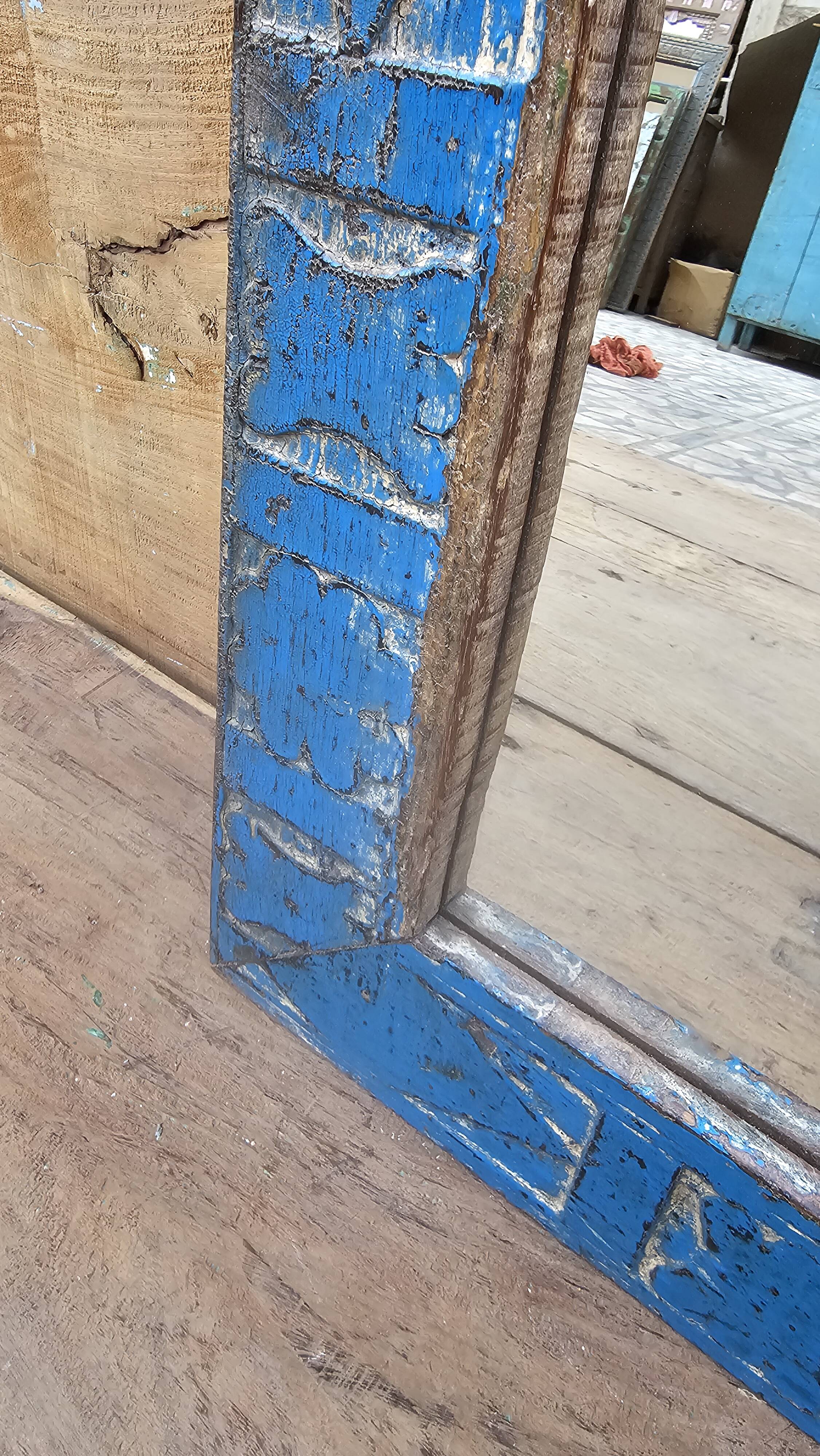 Antique Art Deco mirror in Burmese teak.