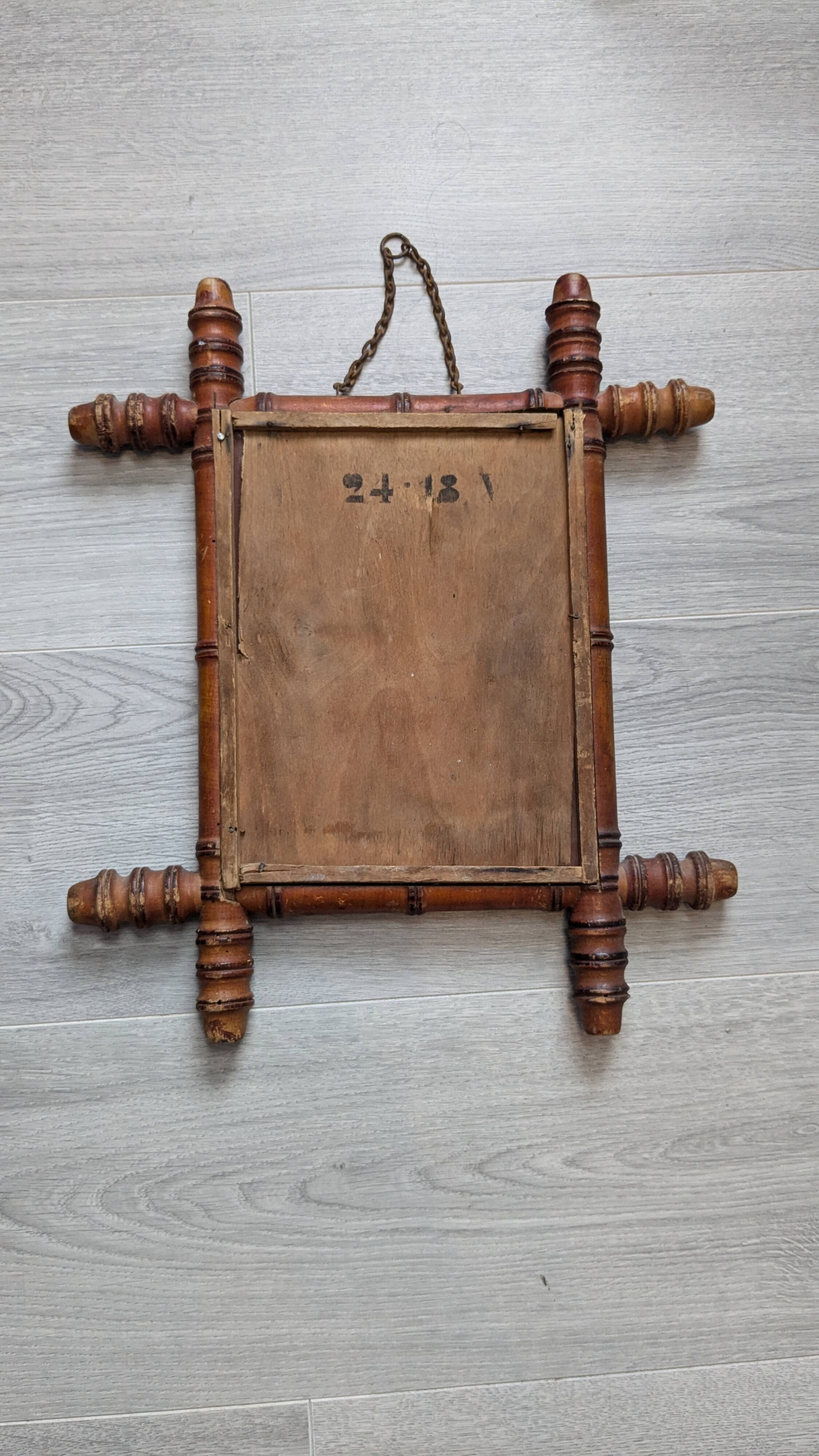 Antique bamboo mirror with pitted glass 40x34 cm