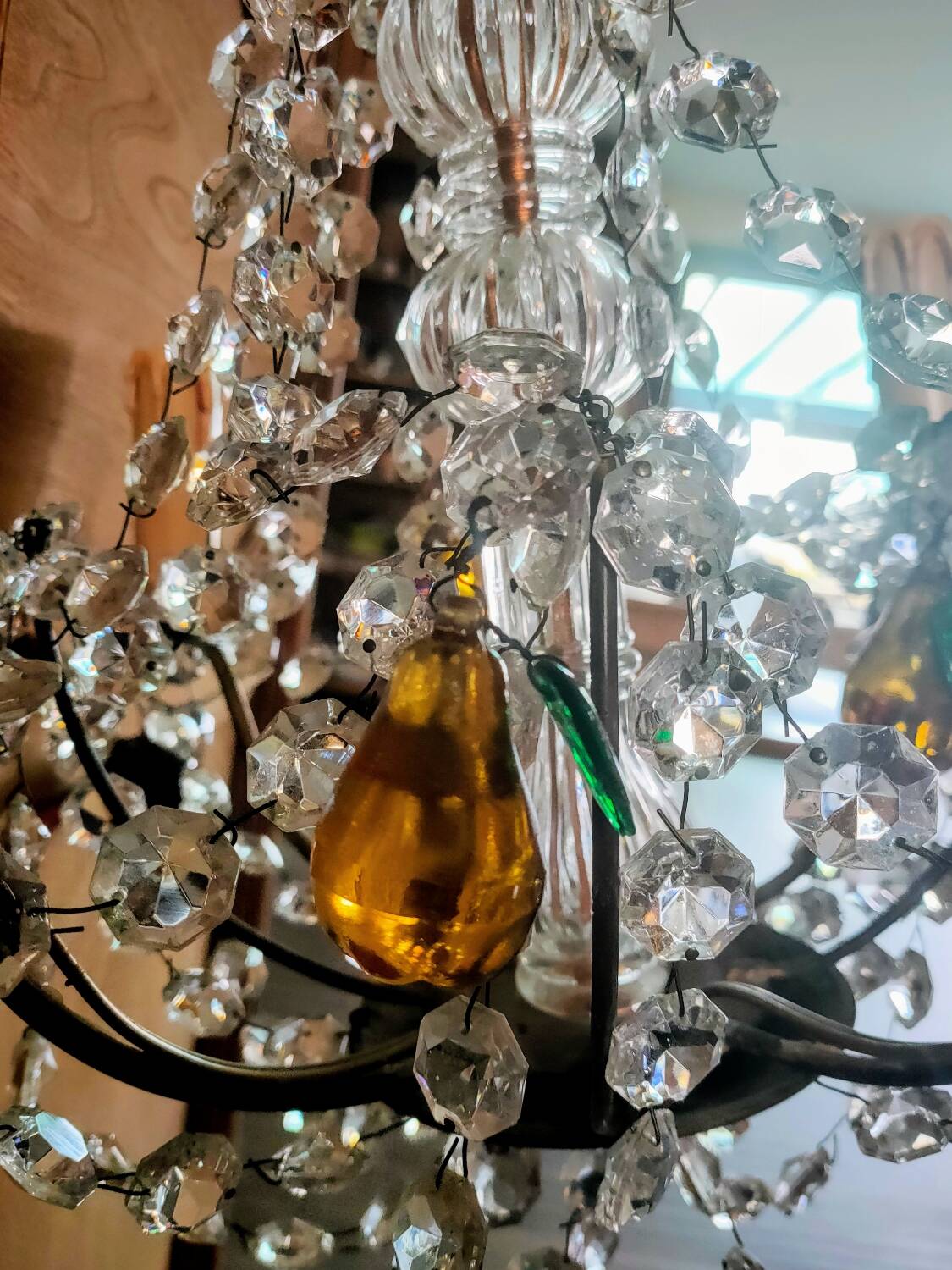 Golden bronze chandelier with fruit pendants