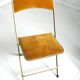 Chaise pliante en velours et métal doré