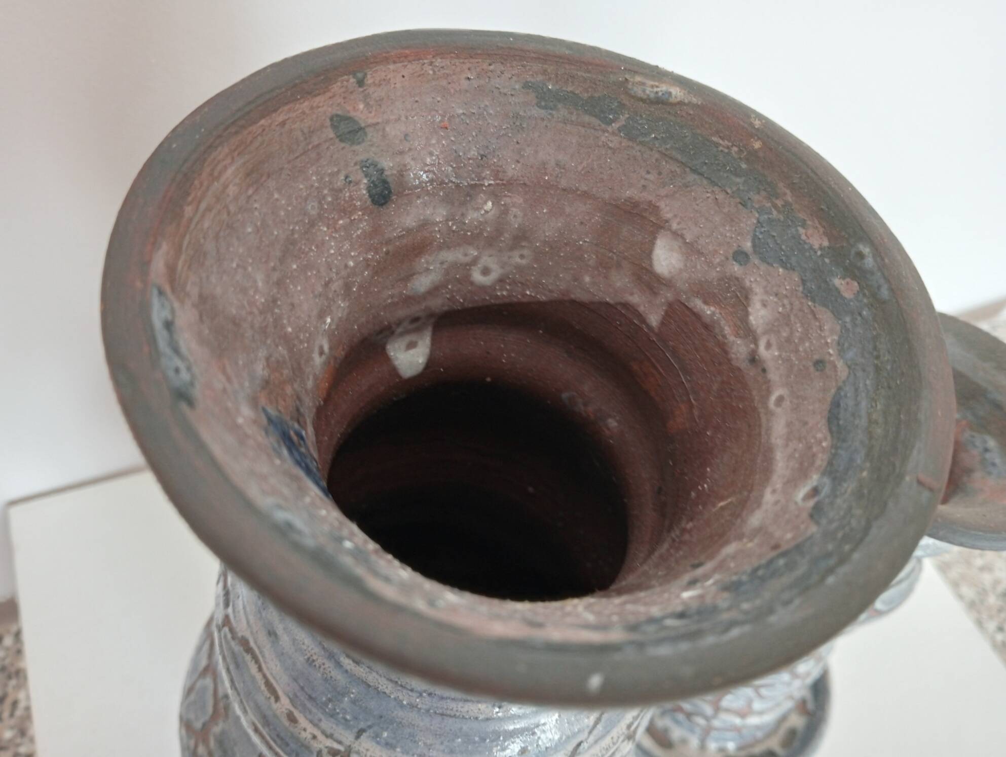 Blue glazed terracotta vase and candle holder