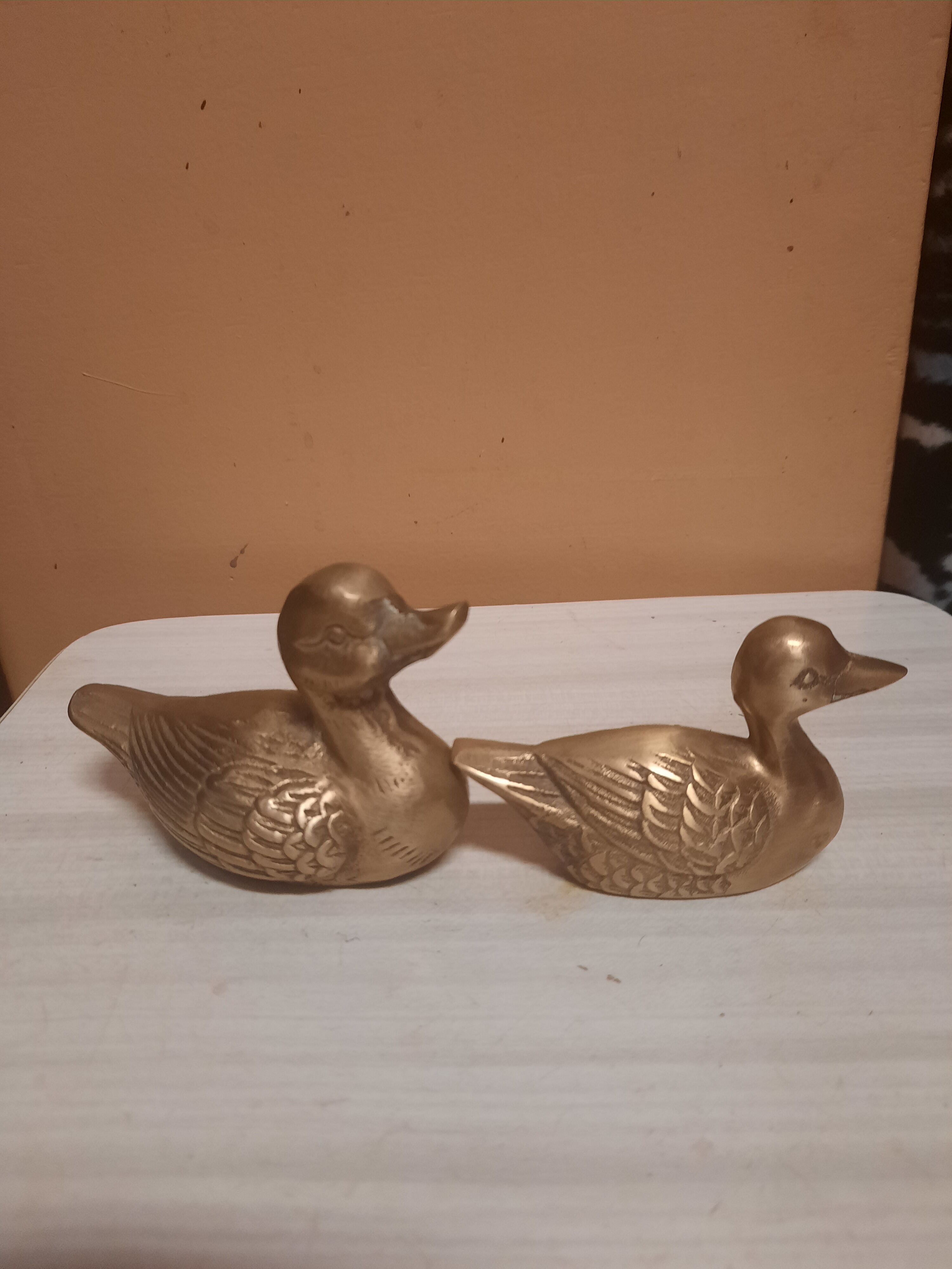 Set of two brass ducks