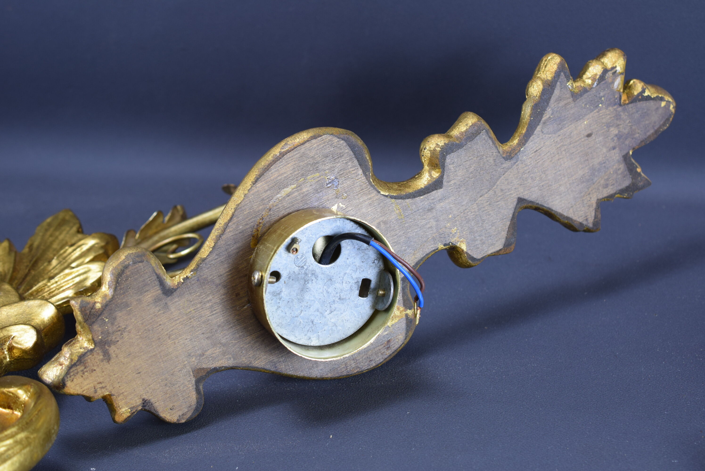 Pair of walled carved wood wall lamps