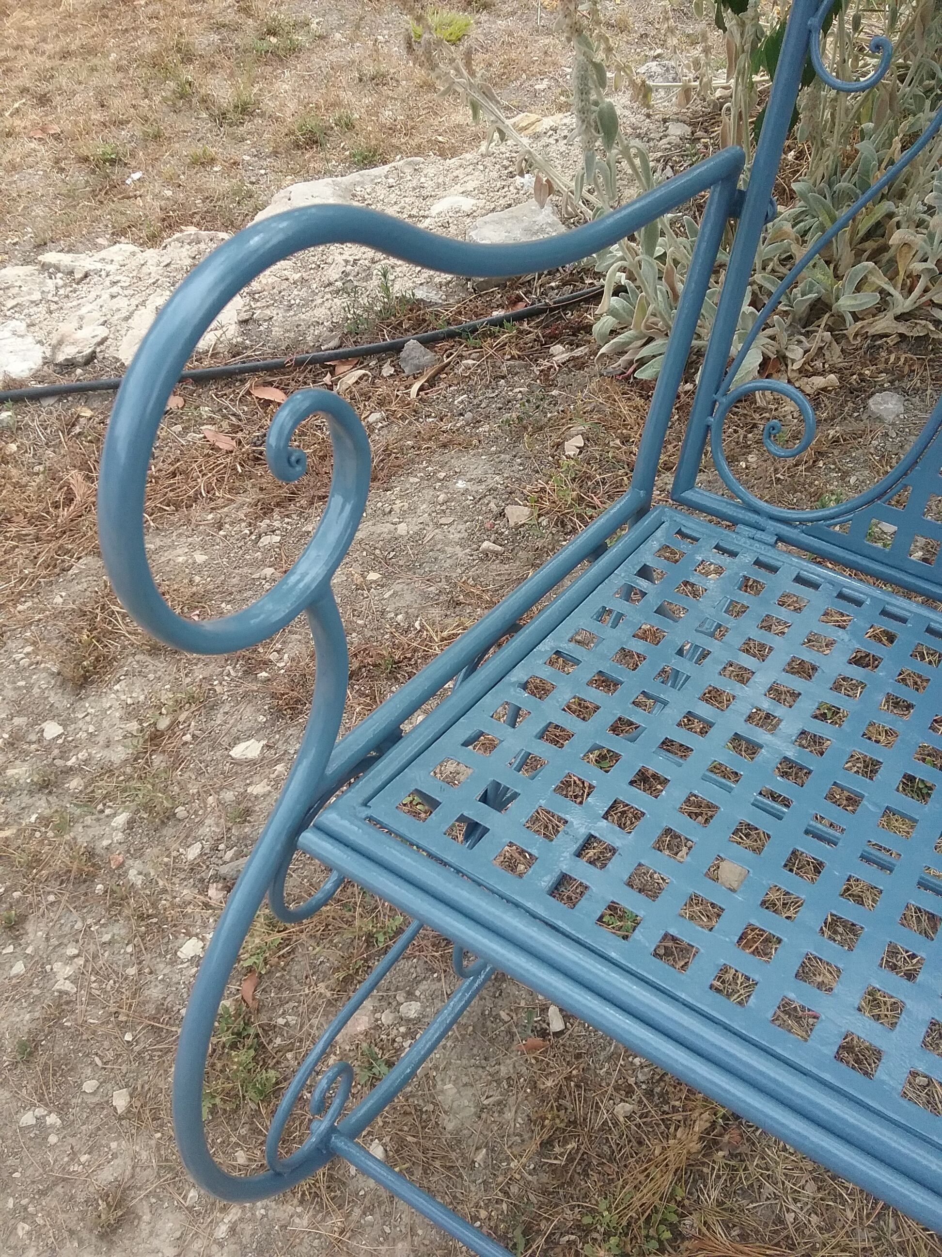 Large wrought iron rocking chair