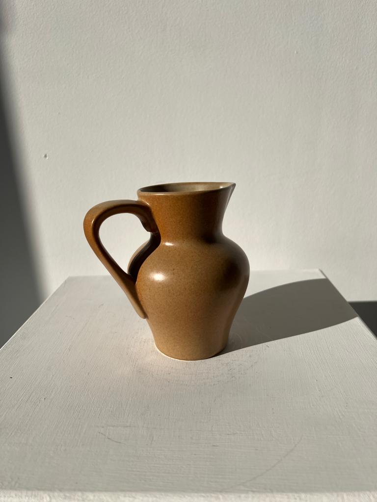 Pitcher in light beige sandstone