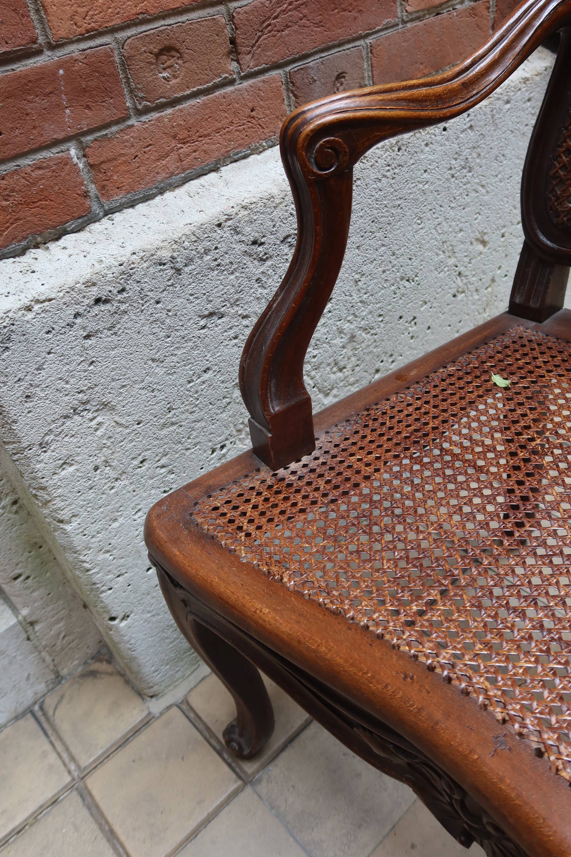 Pair of Louis XV style armchairs in wood and caning.