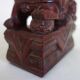 Vintage wooden pair of Foo dogs.