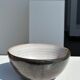 White and glossy brown two-tone ceramic bowl, matt earth