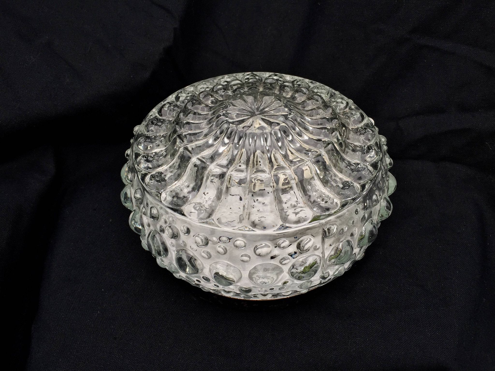 Round ceiling light or wall light in molded glass