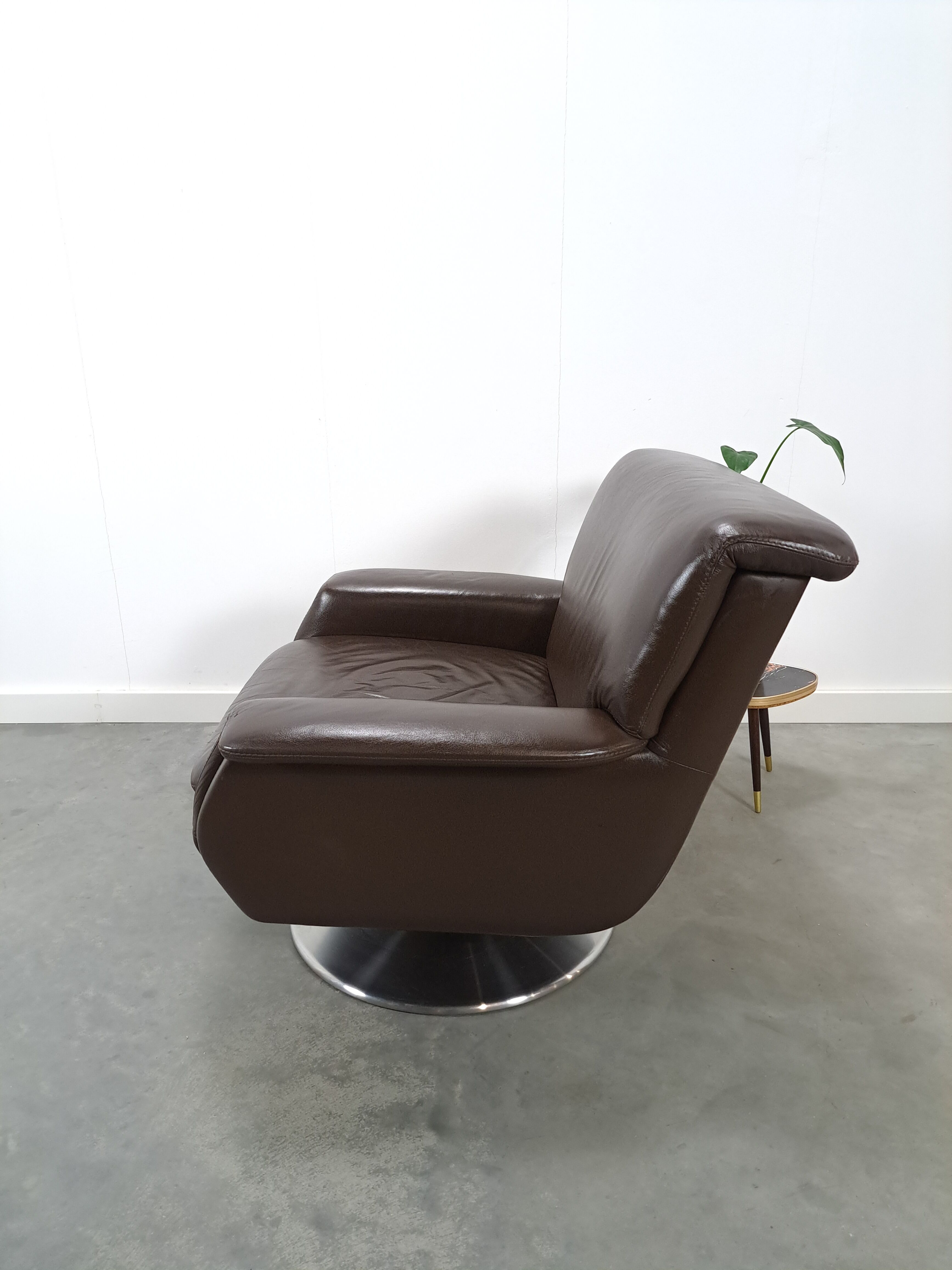 Brown leather swivel chair