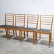 Series of 4 vintage chairs in wood and skaï
