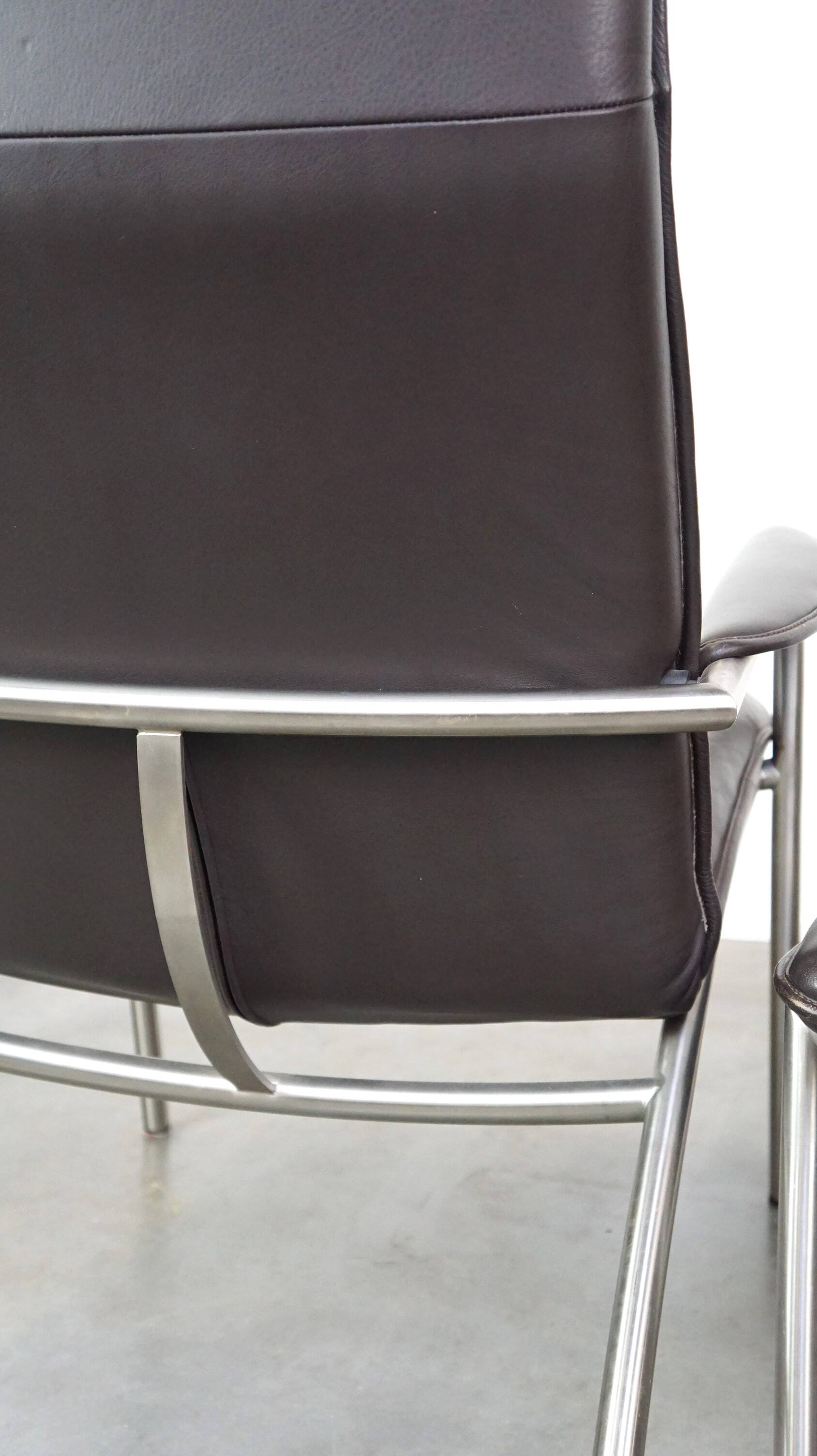 Dark brown leather design armchair + footstool De Sede DS 270
