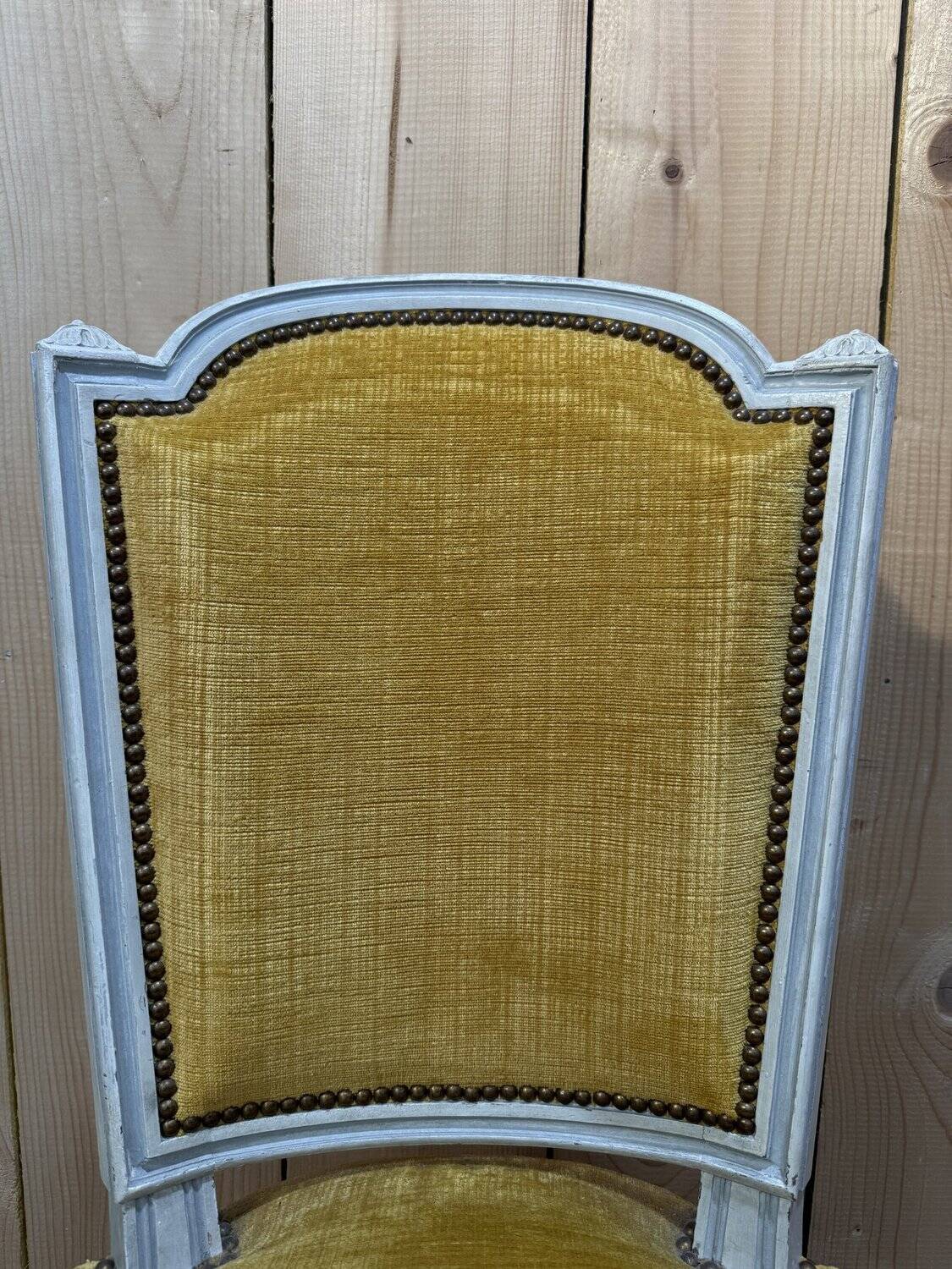 Set of 6 Louis XVI style chairs with polished wood and velvet.