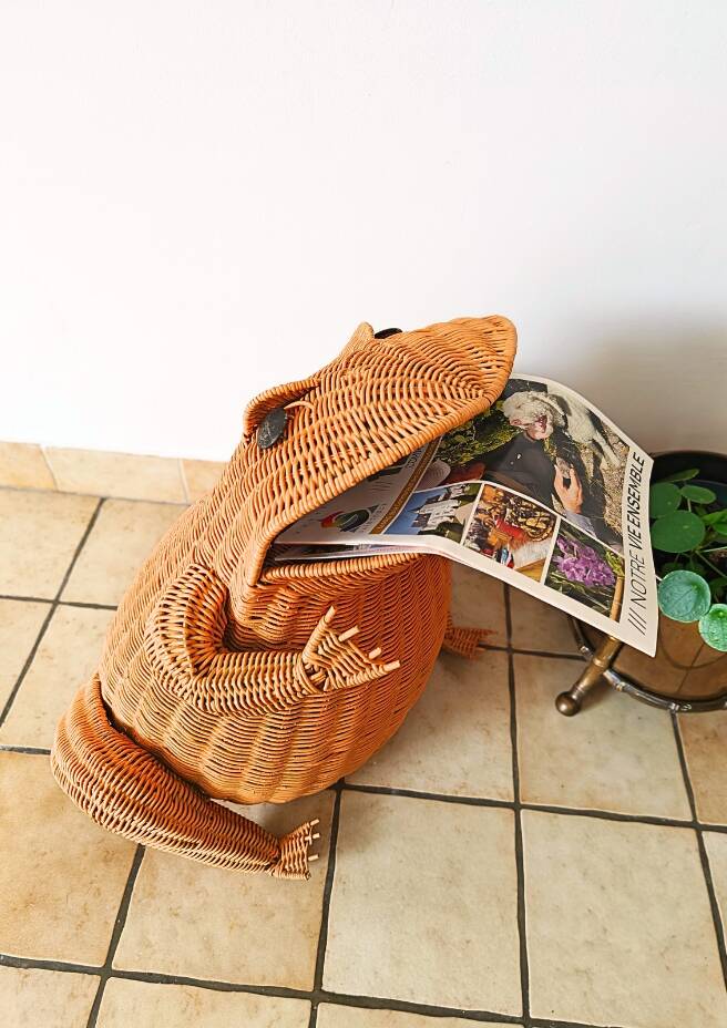 Vintage frog magazine rack in woven wicker design by Olivier Cajan