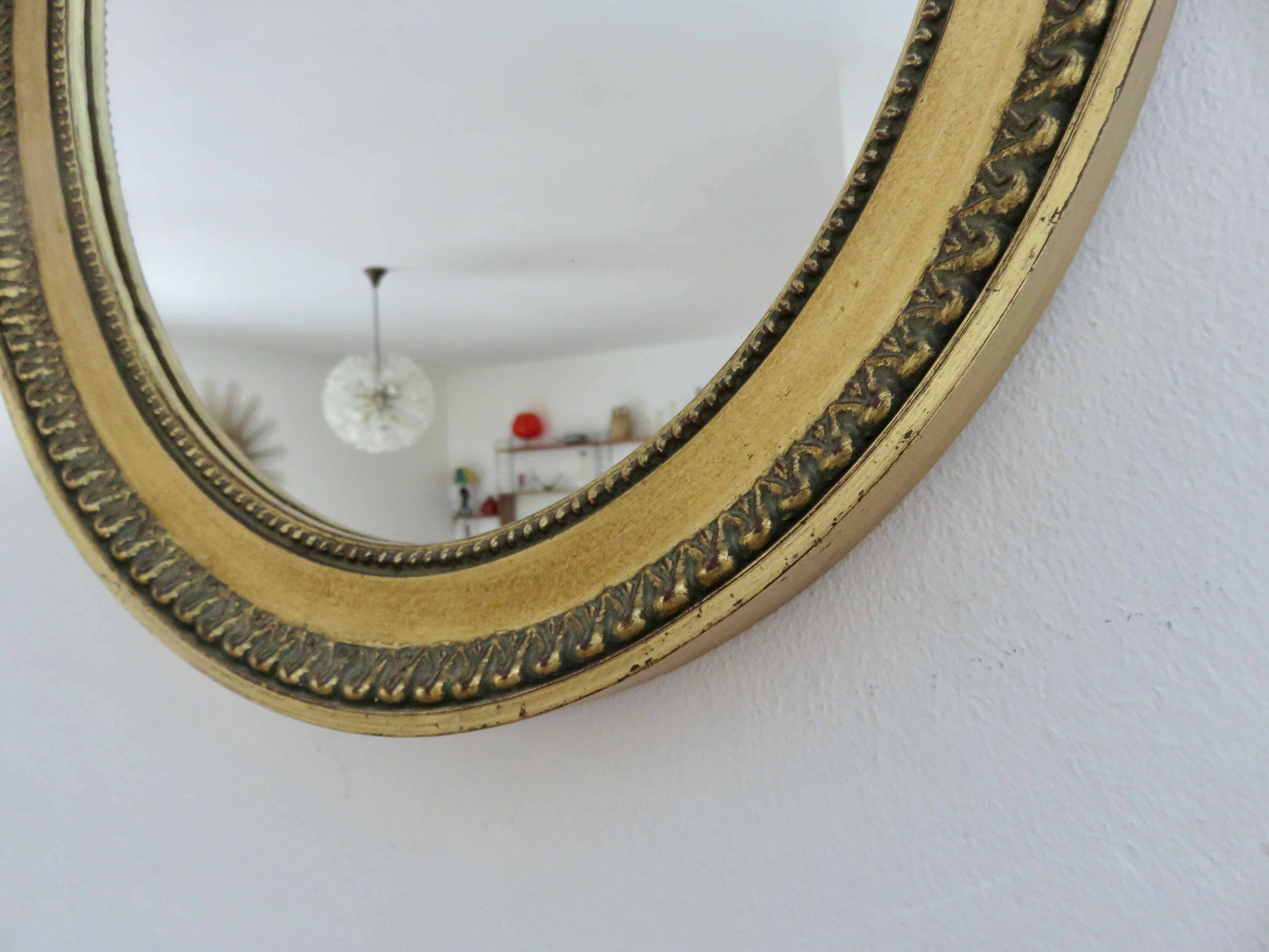 Louis Philippe oval gold wall mirror, 1950s