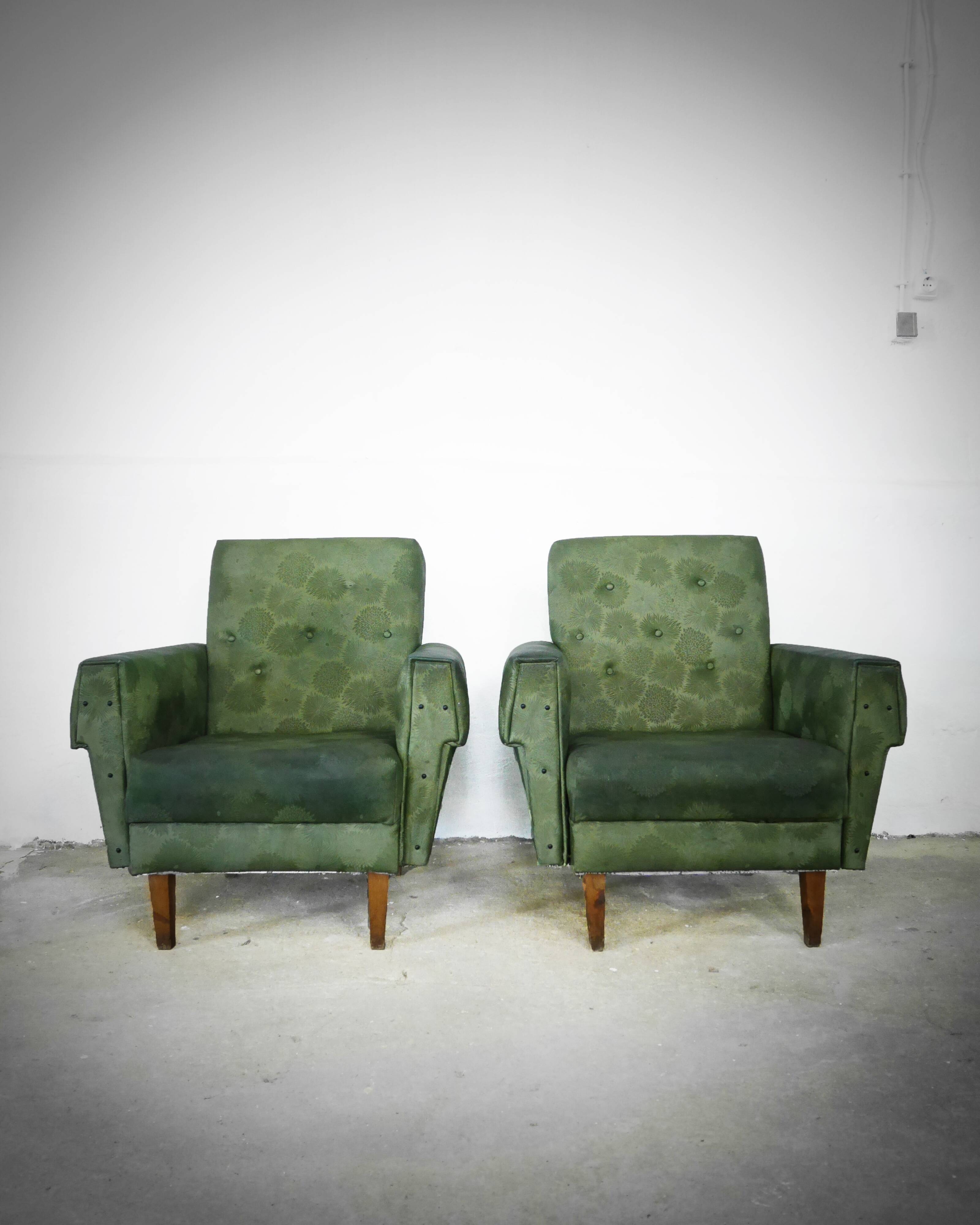 Green armchair in leatherette