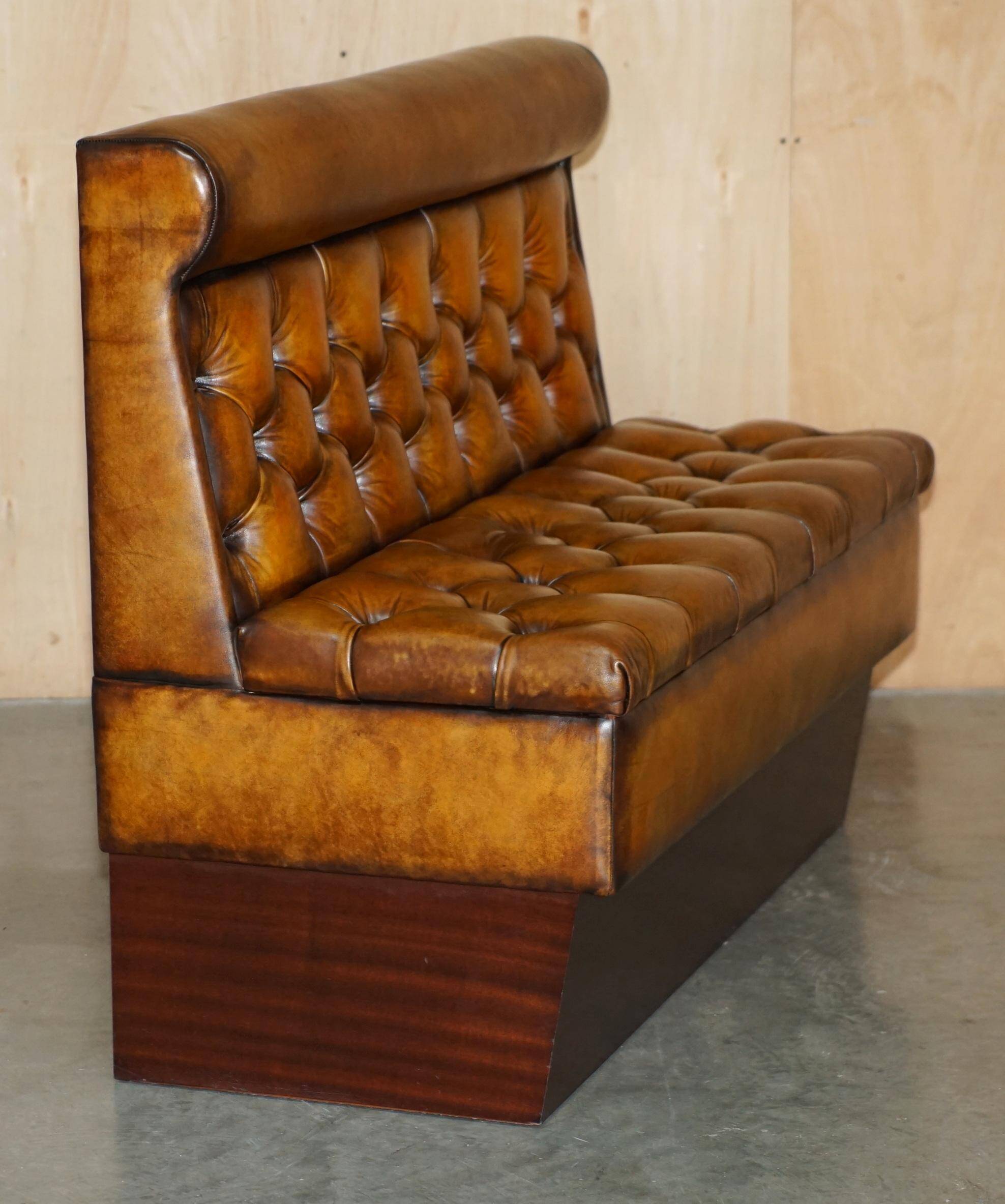 Pair of Victorian Chesterfield pub benches in leather.