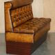 Pair of Victorian Chesterfield pub benches in leather.